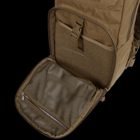 The Condor Fuel Hydration Backpack 18L in brown features an open front pocket with an interior mesh zippered compartment for gear organization and an external buckle closure.